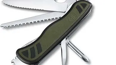 Close-up of a multi-tool with an olive green and black handle, showing a serrated blade, saw, and screwdriver unfolded.
